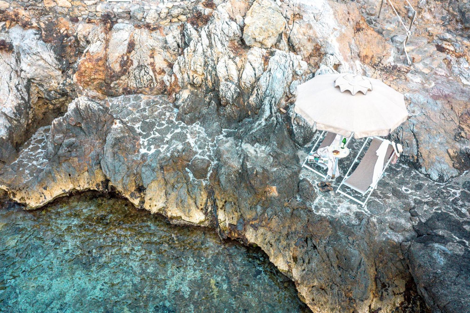 Boutique Hotel Torre Di Cala Piccola ปอร์โต ซานโต สเตฟาโน ภายนอก รูปภาพ