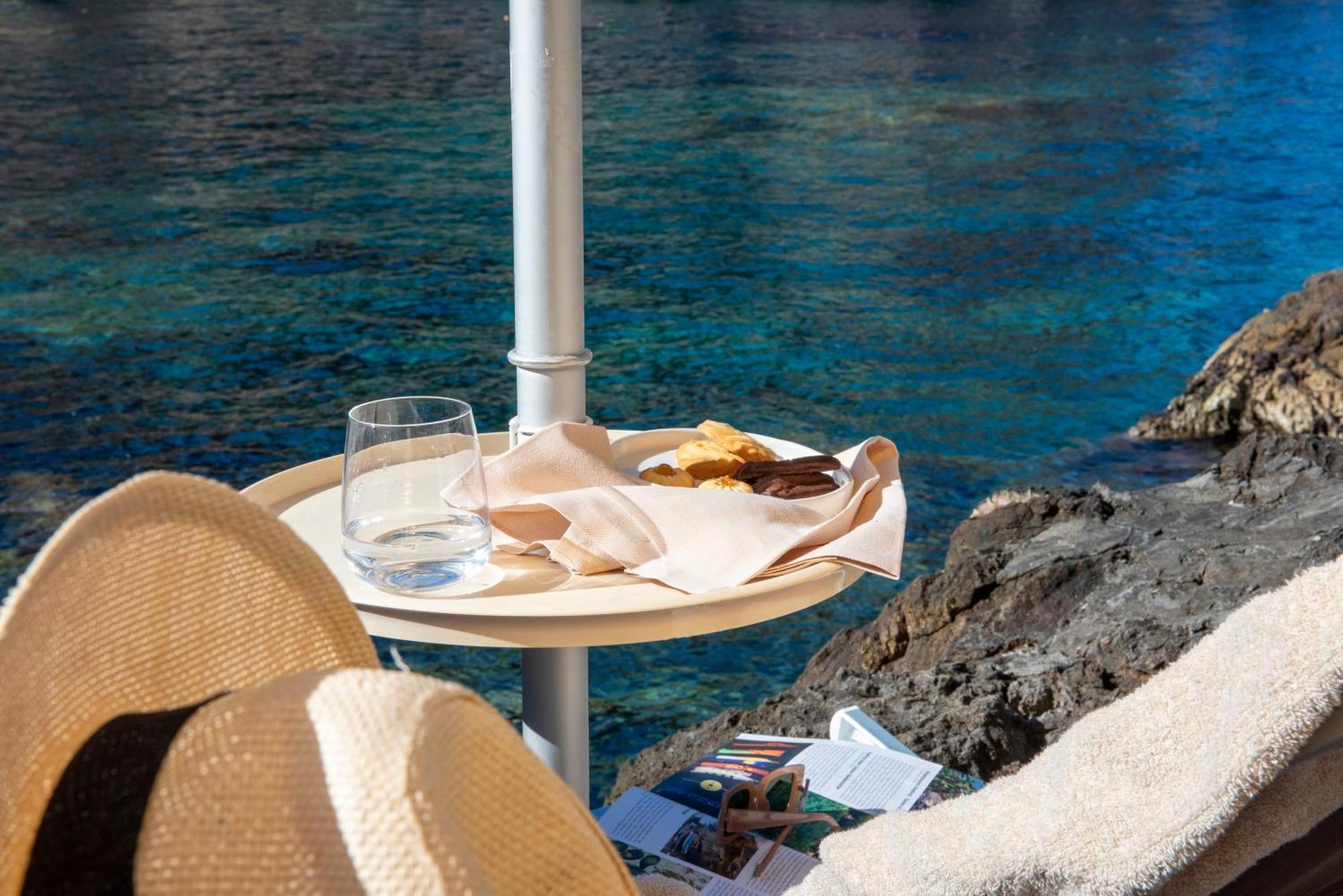 Boutique Hotel Torre Di Cala Piccola ปอร์โต ซานโต สเตฟาโน ภายนอก รูปภาพ